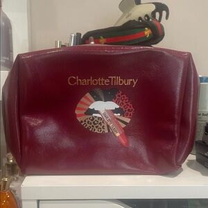 New with tags Charlotte Tilbury Burgundy Cosmetic Bag